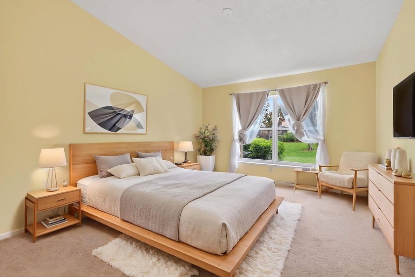 A MUST-See! This charming NEW 2025 ROOF and lakefront villa is - photo 26