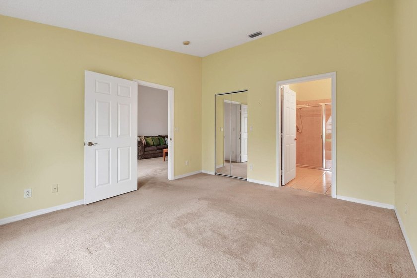 A MUST-See! This charming NEW 2025 ROOF and lakefront villa is - photo 29