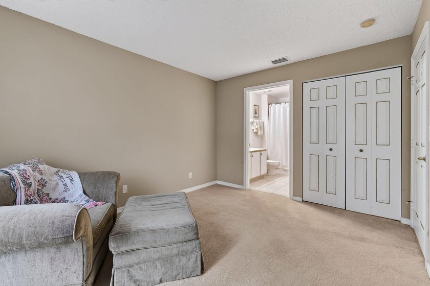 A MUST-See! This charming NEW 2025 ROOF and lakefront villa is - photo 39