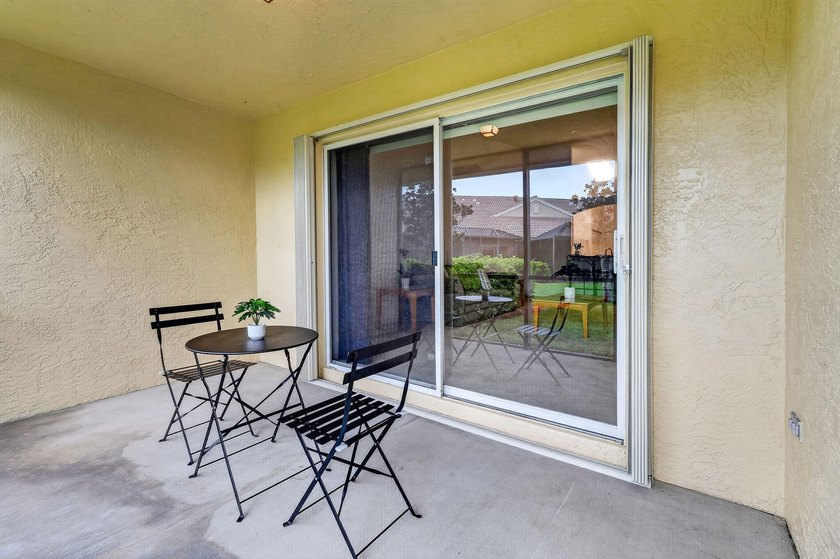 A MUST-See! This charming NEW 2025 ROOF and lakefront villa is - photo 44