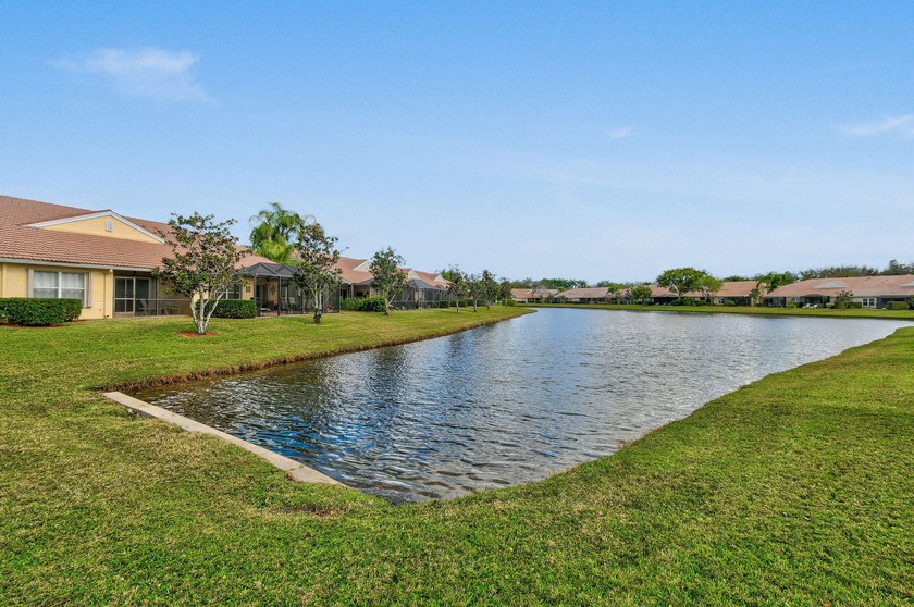 A MUST-See! This charming NEW 2025 ROOF and lakefront villa is - photo 49