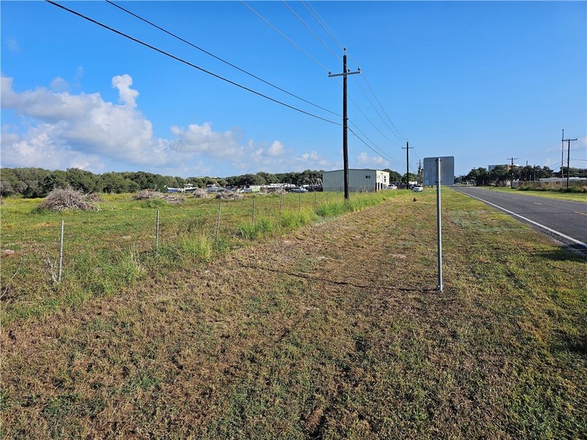 L shaped Property with Majority of the frontage on 2725 also - photo 2