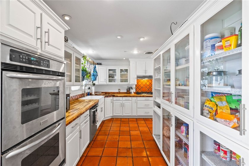 This beautifully updated 4-bedroom, 2.5-bath home offers the - photo 15