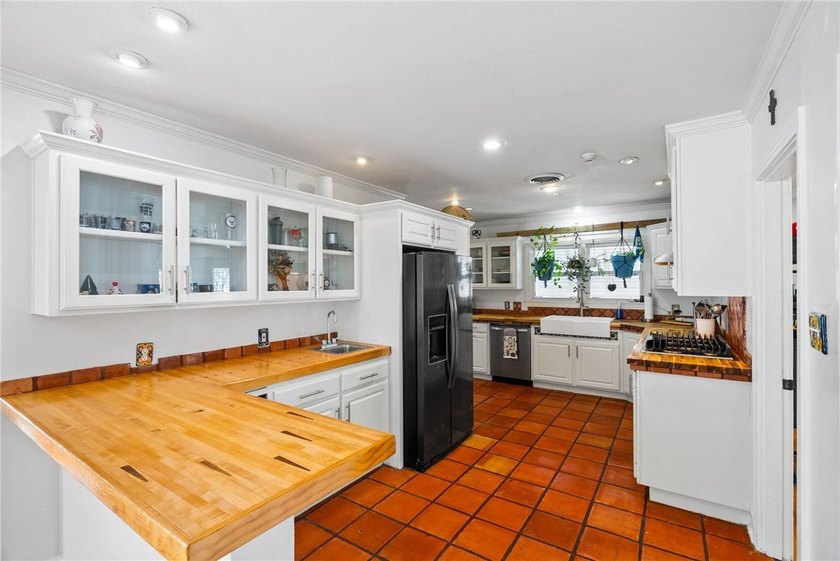 This beautifully updated 4-bedroom, 2.5-bath home offers the - photo 17