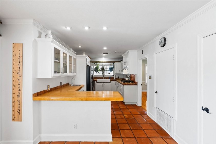 This beautifully updated 4-bedroom, 2.5-bath home offers the - photo 18