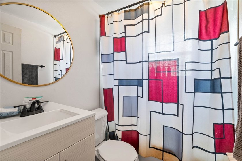 This beautifully updated 4-bedroom, 2.5-bath home offers the - photo 25