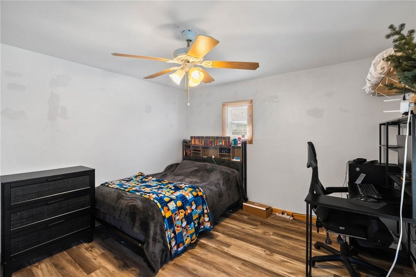 This beautifully updated 4-bedroom, 2.5-bath home offers the - photo 26