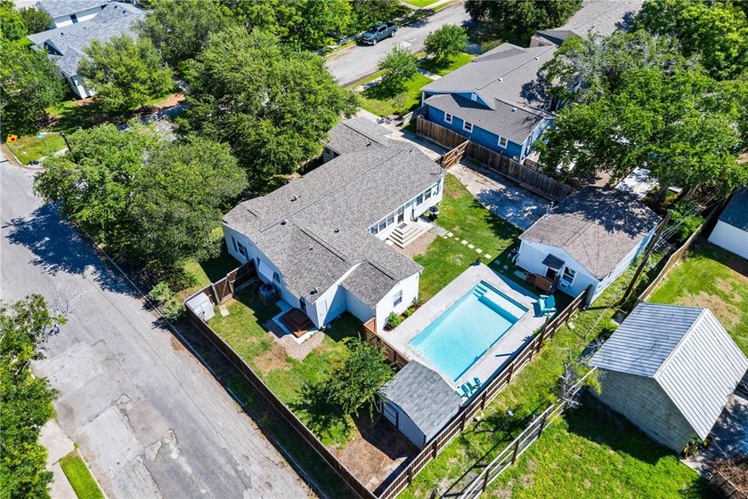 This beautifully updated 4-bedroom, 2.5-bath home offers the - photo 32