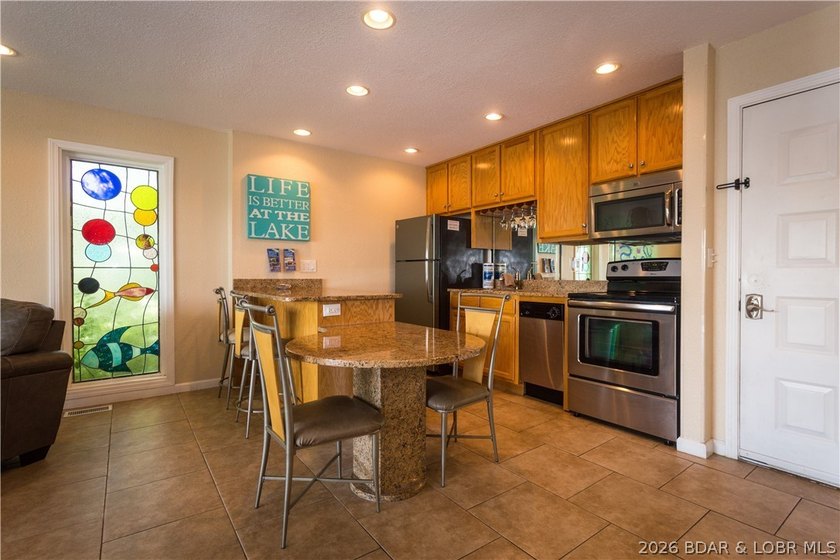 Welcome to this beautifully updated 1-bedroom lakefront end-unit - photo 28