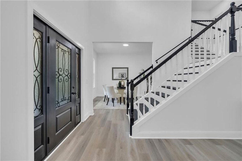 This stunning newly built residence in Douglasville offers the - photo 4
