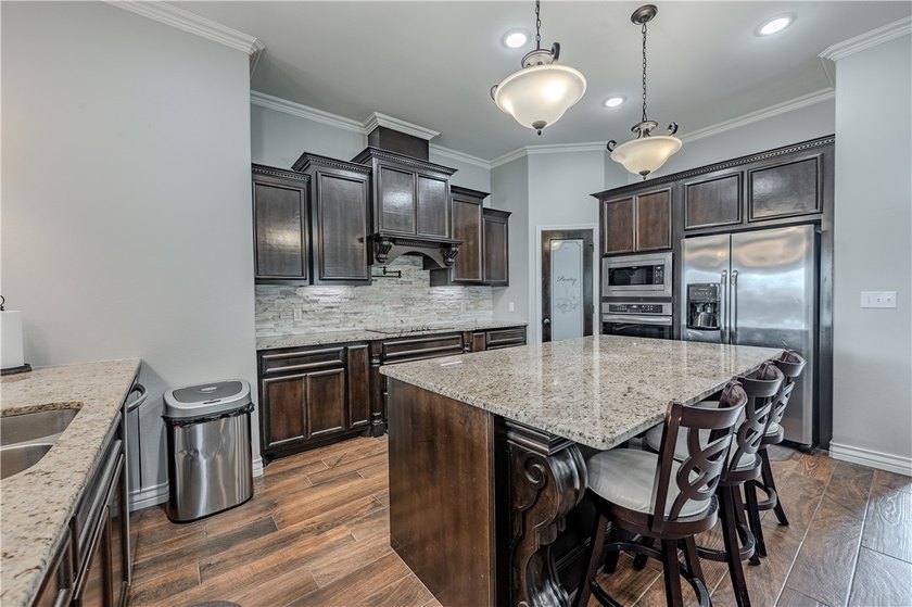 Discover luxury living in this beautifully designed 4-bedroom - photo 11