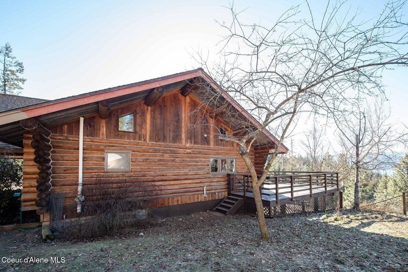 Perched on more than 8 private acres, this exceptional custom - photo 4