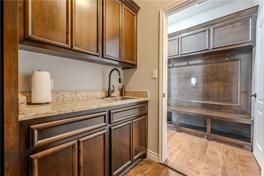 Discover luxury living in this beautifully designed 4-bedroom - photo 30