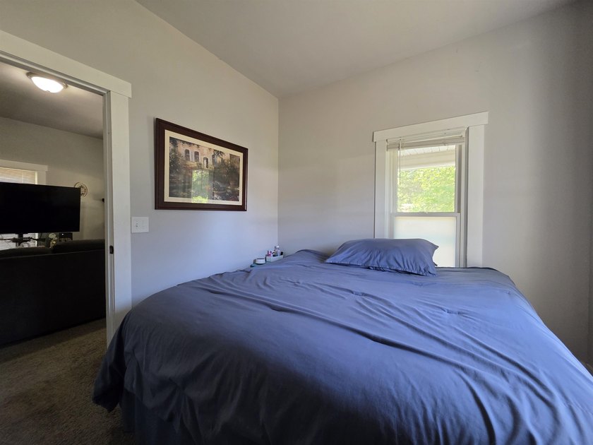 This efficient 2-bedroom, 1-bathroom single-story home offers a - photo 14