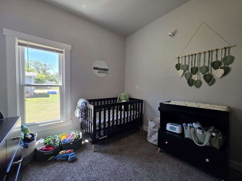 This efficient 2-bedroom, 1-bathroom single-story home offers a - photo 15