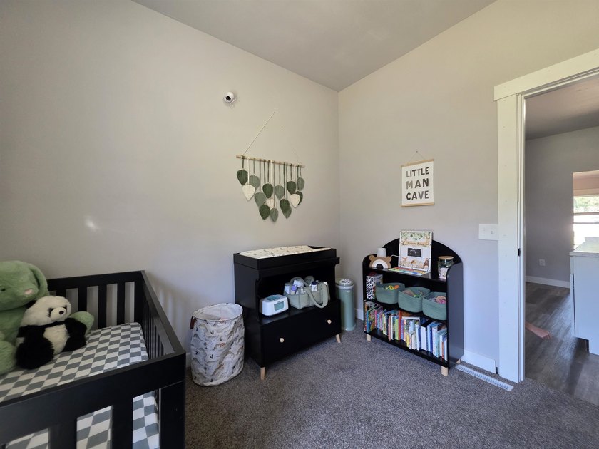 This efficient 2-bedroom, 1-bathroom single-story home offers a - photo 16