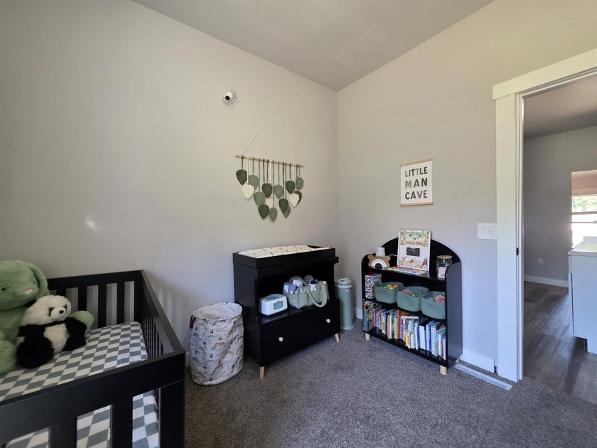 This efficient 2-bedroom, 1-bathroom single-story home offers a - photo 17