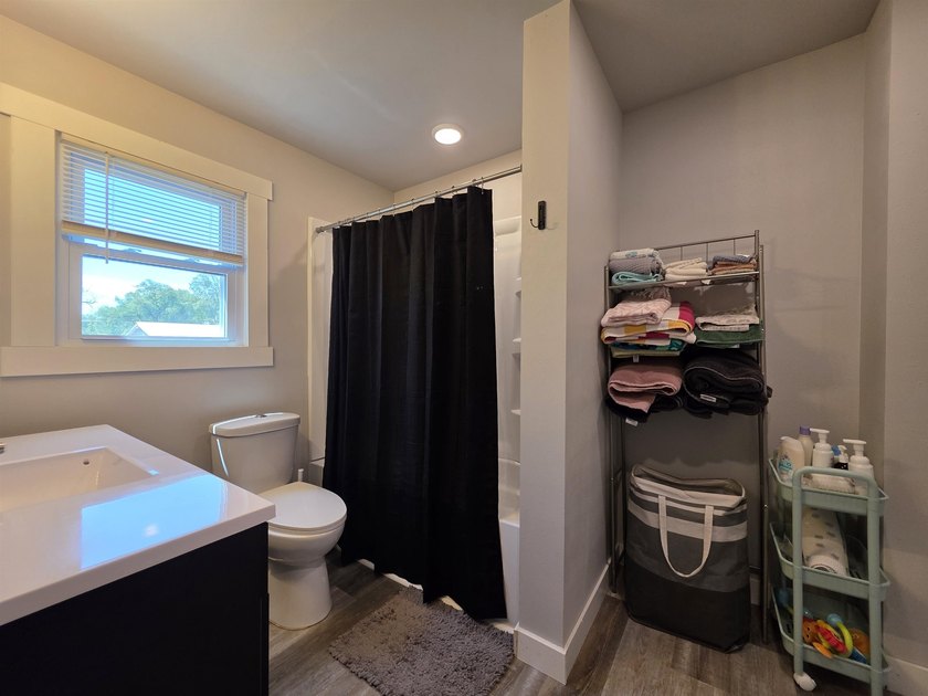 This efficient 2-bedroom, 1-bathroom single-story home offers a - photo 18
