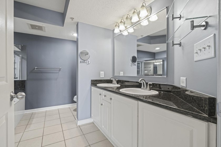 Welcome to Yacht Club Villas in the highly sought-after Barefoot - photo 27