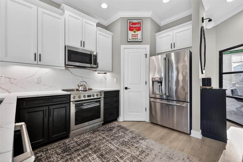 Experience elevated, maintenance-free living in this beautifully - photo 11