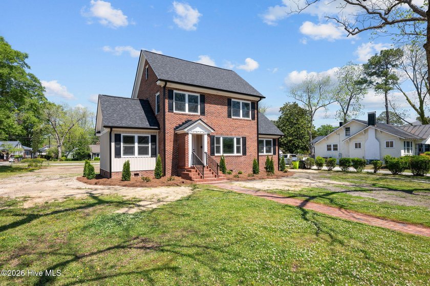 Step into this beautifully restored 1940's home, now with modern - photo 2