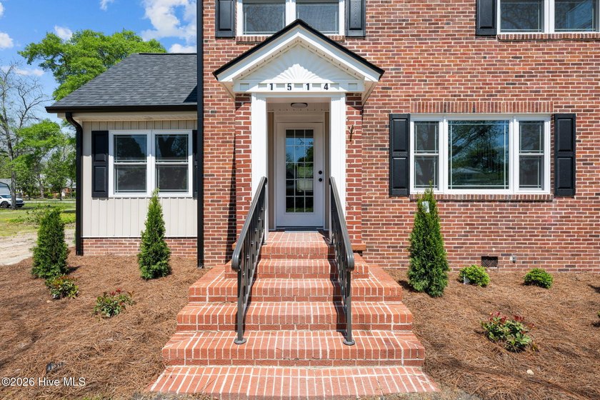 Step into this beautifully restored 1940's home, now with modern - photo 3