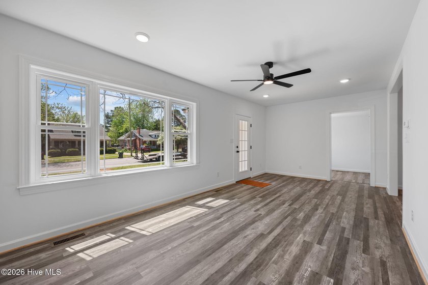 Step into this beautifully restored 1940's home, now with modern - photo 7