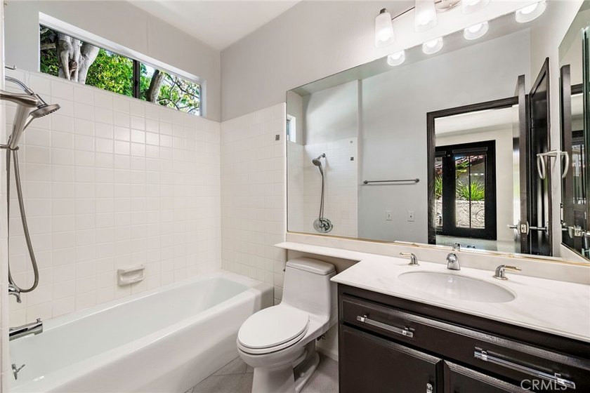 Welcome to this beautiful pool home in Crown Pointe, an - photo 19