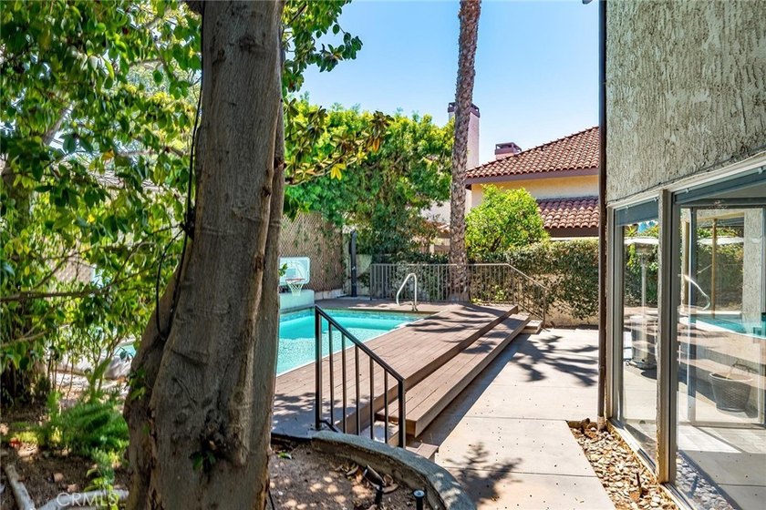 Welcome to this beautiful pool home in Crown Pointe, an - photo 38