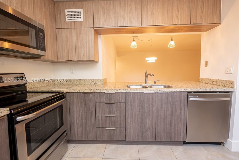 Welcome to this beautifully updated 2-bedroom, 2-bath garden - photo 22