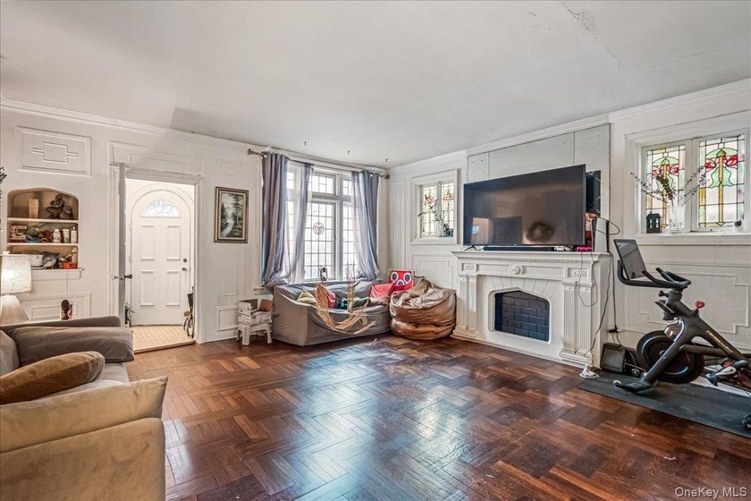 Welcome to 1404 E 49th Street, a semi-detached brick one-family - photo 4