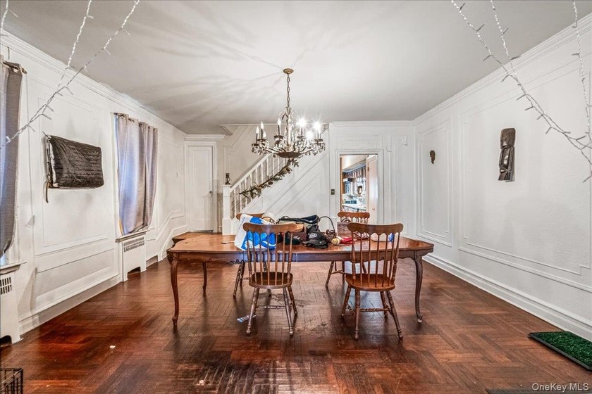 Welcome to 1404 E 49th Street, a semi-detached brick one-family - photo 6