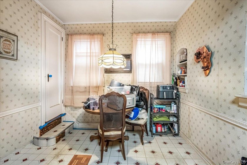 Welcome to 1404 E 49th Street, a semi-detached brick one-family - photo 10