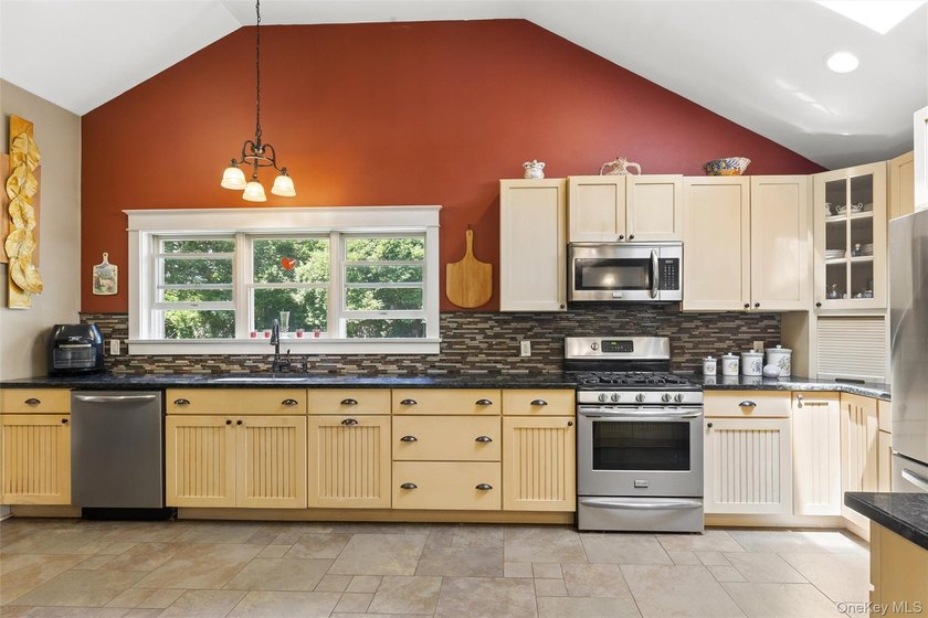 Nestled on a landscaped corner property in the heart of - photo 13
