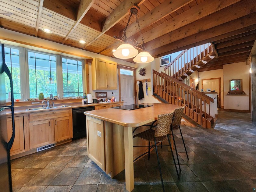 Set on approximately 220 feet of sandy Lake Superior shoreline - photo 14