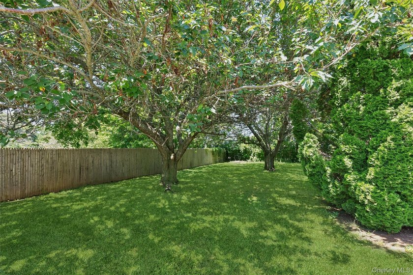 Nestled on a landscaped corner property in the heart of - photo 19