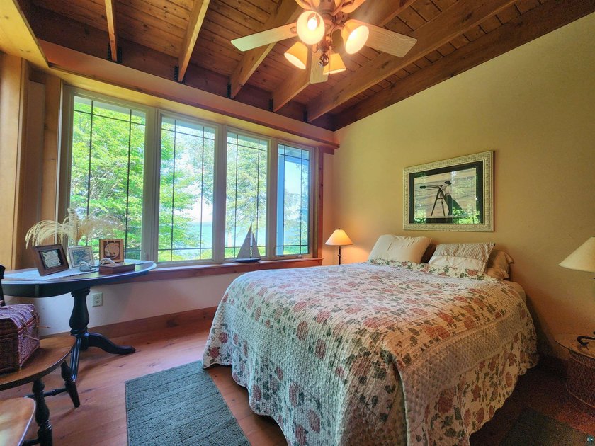 Set on approximately 220 feet of sandy Lake Superior shoreline - photo 23