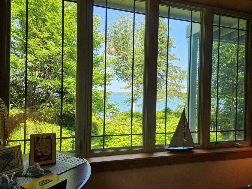 Set on approximately 220 feet of sandy Lake Superior shoreline - photo 24