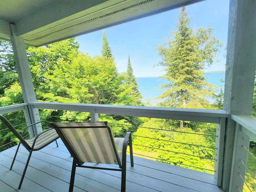 Set on approximately 220 feet of sandy Lake Superior shoreline - photo 29