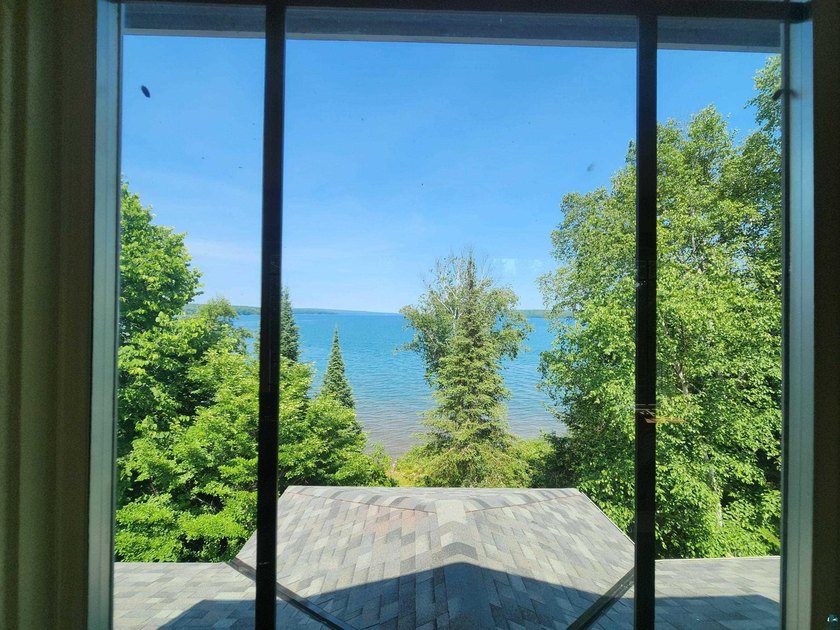 Set on approximately 220 feet of sandy Lake Superior shoreline - photo 30