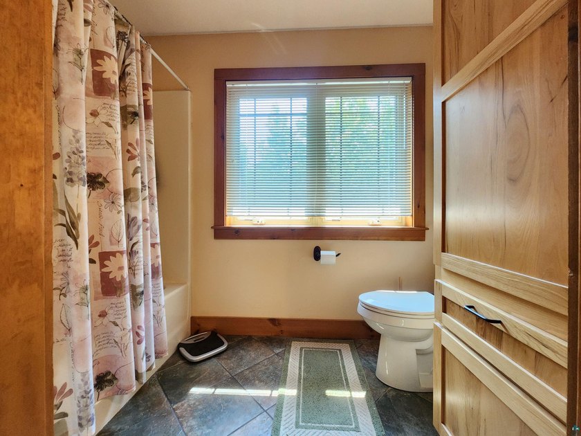 Set on approximately 220 feet of sandy Lake Superior shoreline - photo 35