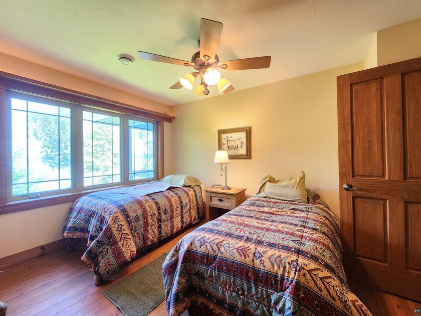 Set on approximately 220 feet of sandy Lake Superior shoreline - photo 39