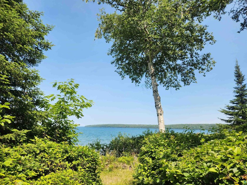 Set on approximately 220 feet of sandy Lake Superior shoreline - photo 50