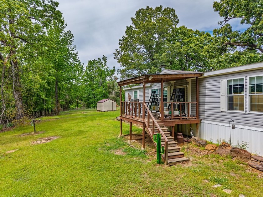Well-maintained 3 bedroom, 2 bath mobile home on 74 acres. The - photo 6