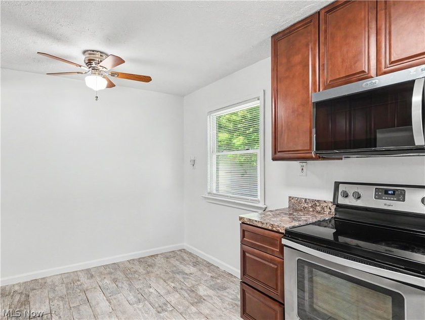 This 3-bedroom, 2-bath bungalow offers a bright, open feel with - photo 12