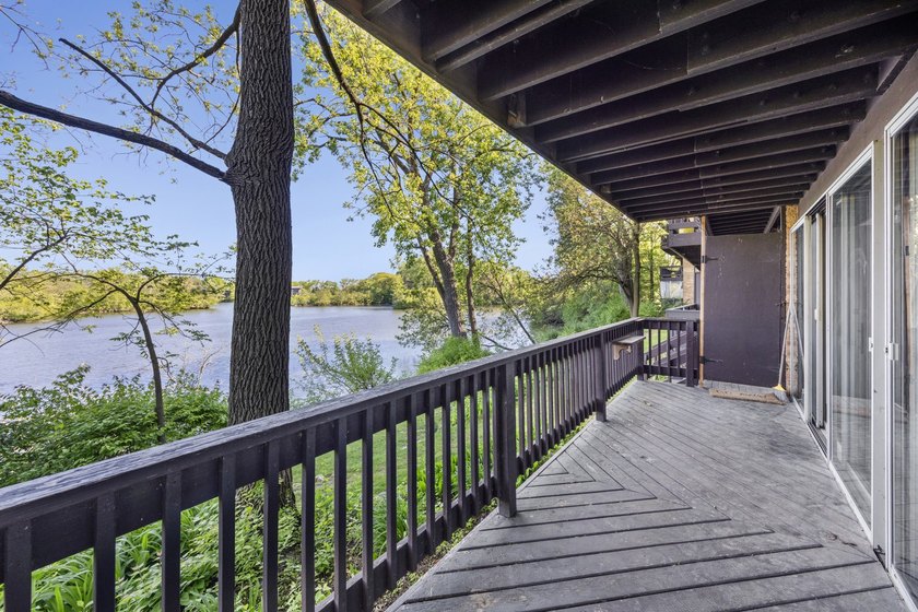 Great view of lake from spacious balcony and wall of windows - photo 14