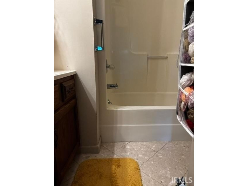 A rare find at Eagle pointe a ground level Waters Edge unit with - photo 16