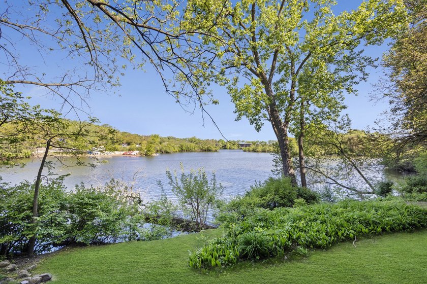 Great view of lake from spacious balcony and wall of windows - photo 16