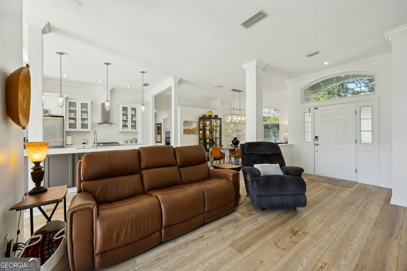 THIS BEAUTIFULLY UPDATED THREE-BEDROOM HOME IN OSPREY COVE IS - photo 11
