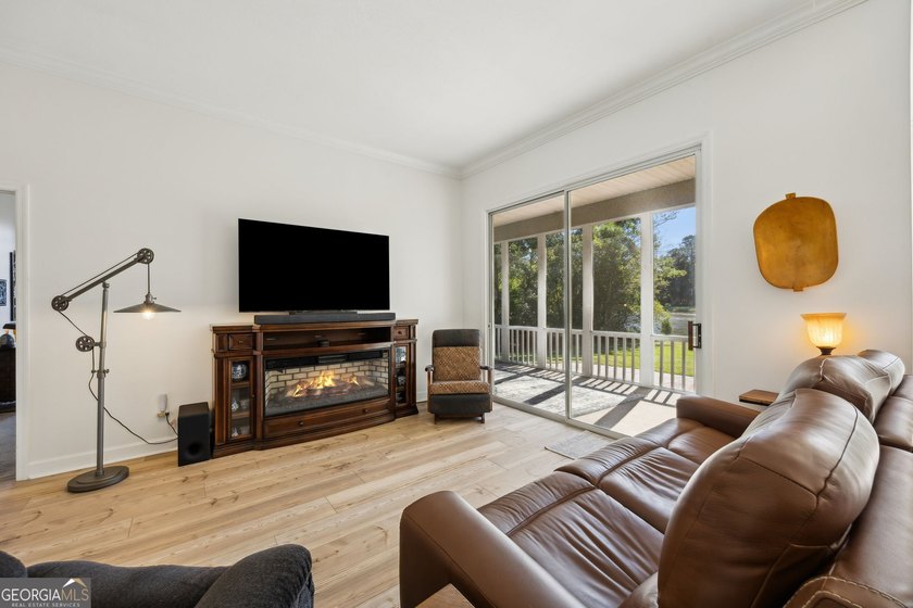 THIS BEAUTIFULLY UPDATED THREE-BEDROOM HOME IN OSPREY COVE IS - photo 12